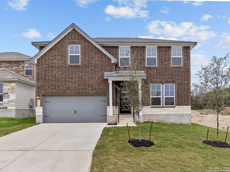 Front exterior of a new home in Royal Crest, San Antonio, TX, highlighting curb appeal (Image 2).