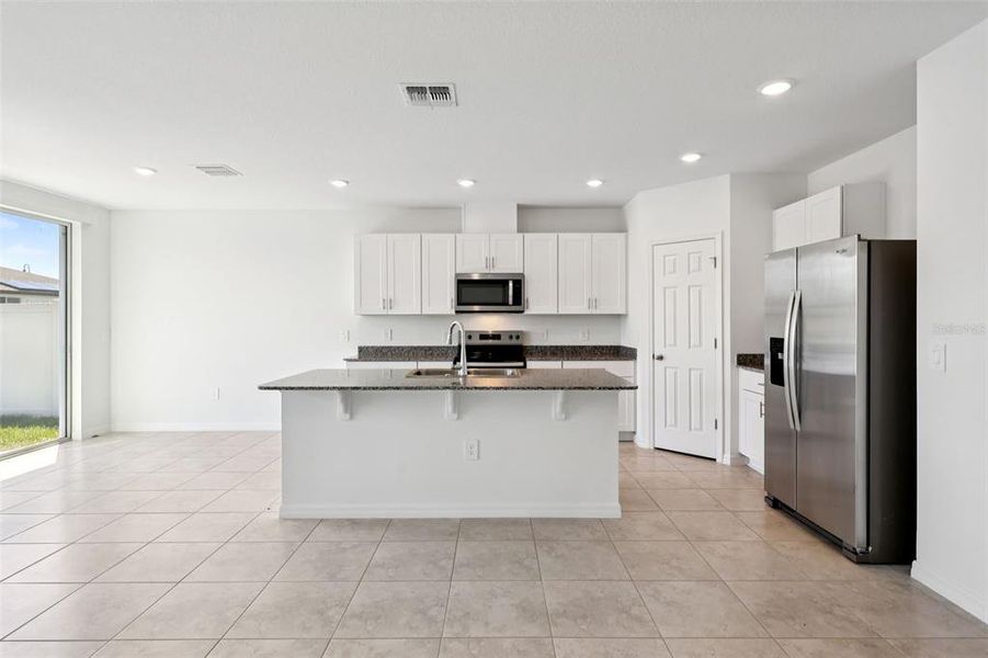 Furnished interior view inside a new home in Deer Run at Crosswinds, Davenport (Image 8).