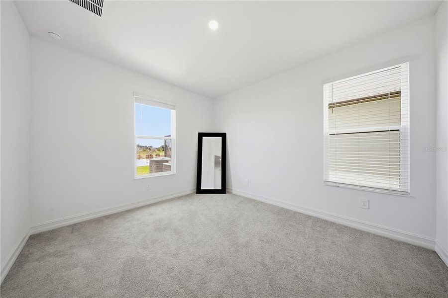 Spacious, unfurnished interior of a new home in Connerton, Land O' Lakes (Image 57).