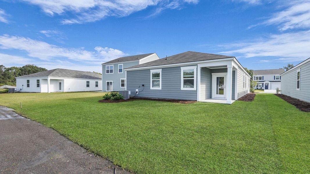 Exterior details and patio area of a home in The Oaks at Center Station, Hollywood (Image 15).