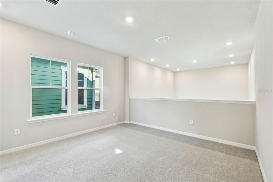 Spacious, unfurnished interior of a new home in Laureate Park at Lake Nona - Garden Series, Orlando (Image 26).