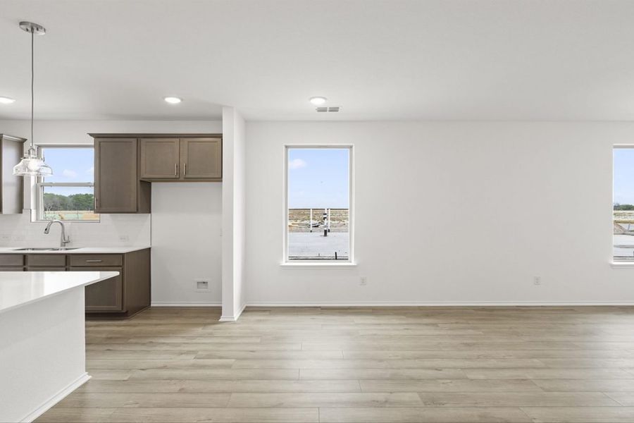 Representative unfurnished interior of a home built from the Kaufman Colony At Pinehurst by Brohn Homes in Colony at Pinehurst, Pinehurst (Image 8).