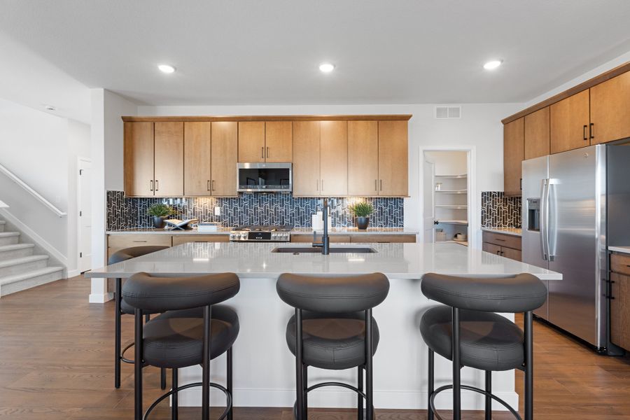 Representative furnished interior of a home built from the The Sunlight by Risewell Homes in Cordovan, Firestone (Image 9).