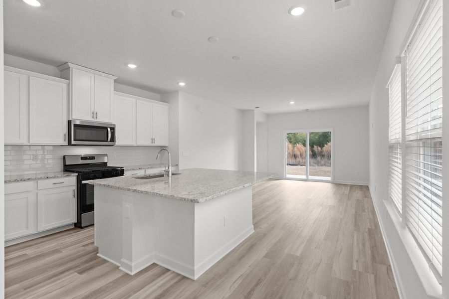 Furnished interior view inside a new home in Cypress Ridge - The Boardwalk Series, Longs (Image 3).