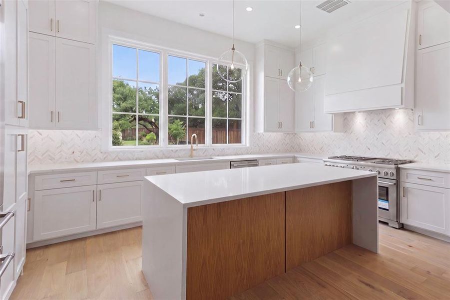 Waterfall island and custom cabinetry