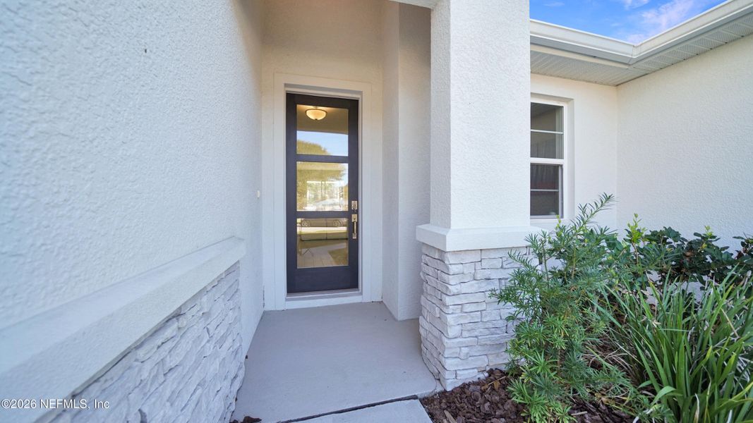 Exterior details and patio area of a home in , Palm Coast (Image 3).