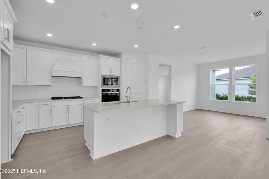 Furnished interior view inside a new home in Summer Bay at Grand Oaks, St. Augustine (Image 9).