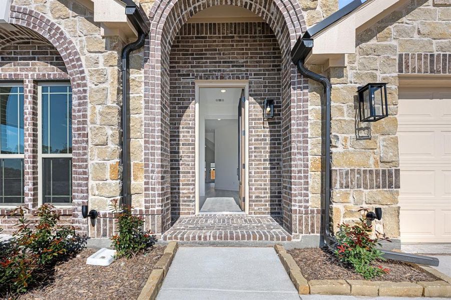 Exterior details and patio area of a home in Meadow Vista 60-65, Anna (Image 4). Exterior details and patio area of a home in Meadow Vista 60-65, Anna (Image 4).