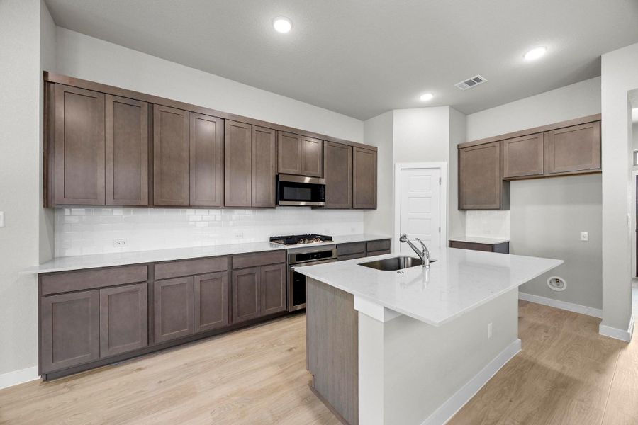 Furnished interior view inside a new home in Lakeside at Tessera, Lago Vista (Image 11). Furnished interior view inside a new home in Lakeside at Tessera, Lago Vista (Image 11).