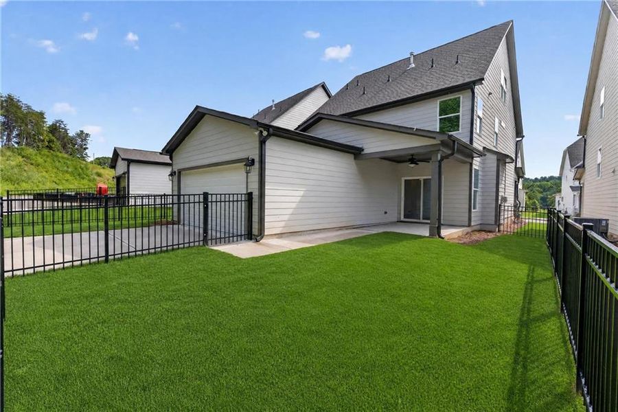 Exterior details and patio area of a home in Marble Tree, Ball Ground (Image 23).