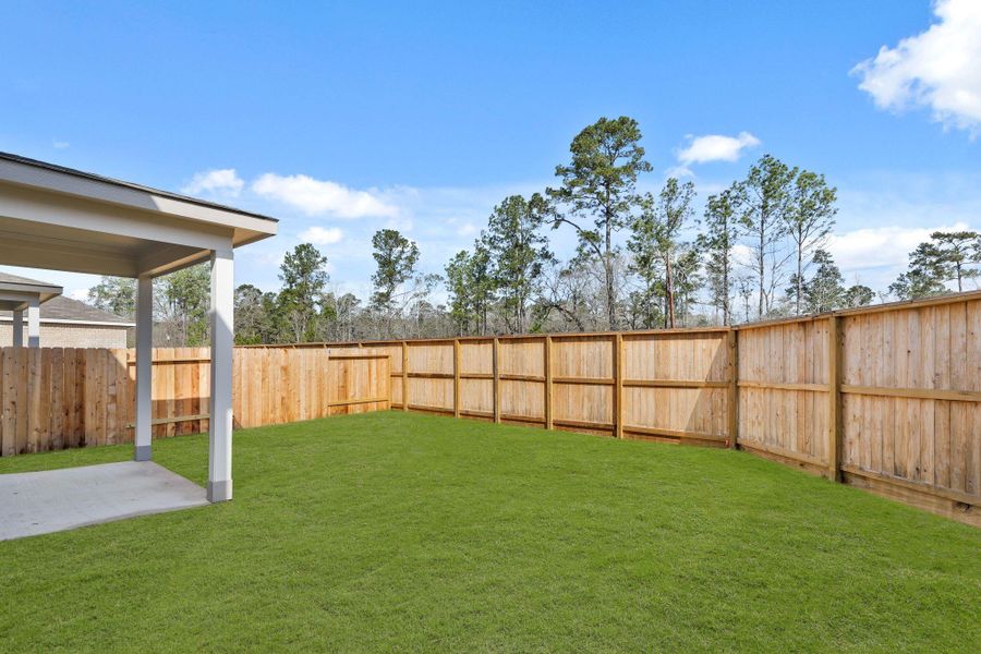Exterior details and patio area of a home in , Magnolia (Image 2). Exterior details and patio area of a home in , Magnolia (Image 2).