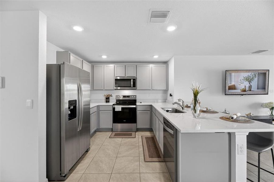 Furnished interior view inside a new home in Berry Bay, Wimauma (Image 12).