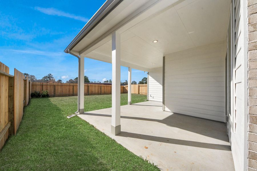 Experience outdoor living at its finest on this expansive covered patio, thoughtfully designed for BBQs and delightful outdoor dining. Experience outdoor living at its finest on this expansive covered patio, thoughtfully designed for BBQs and delightful outdoor dining.