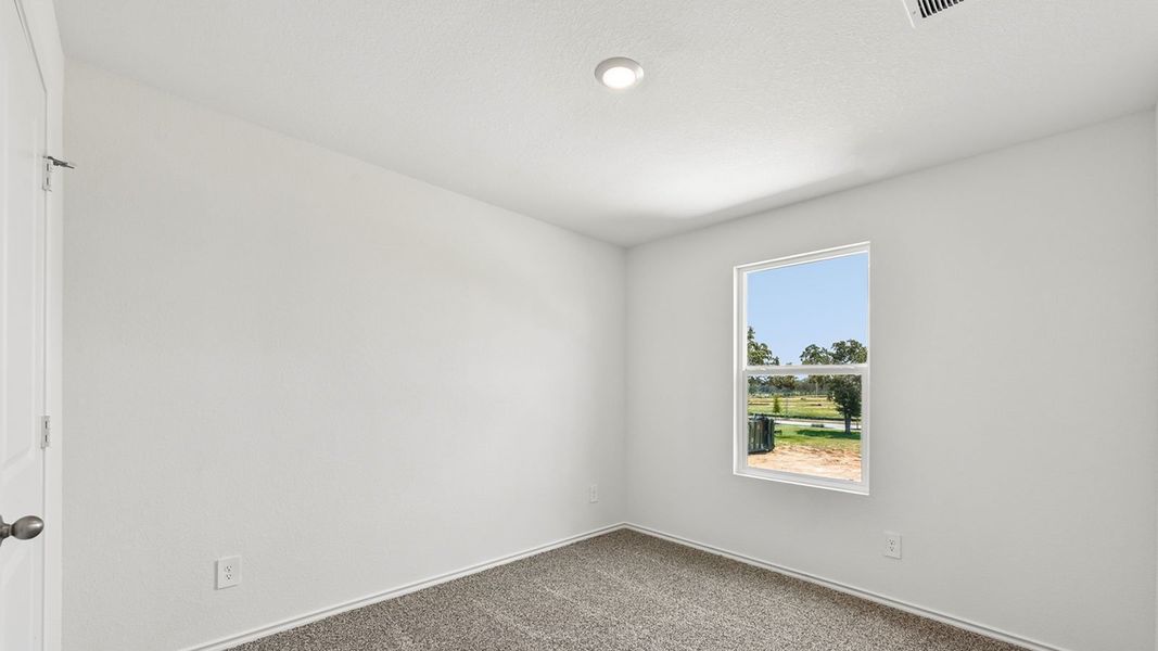 Spacious, unfurnished interior of a new home in Valverde, Bastrop (Image 32).
