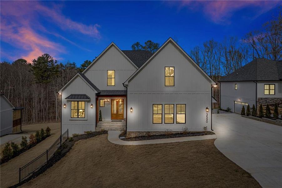 Front exterior of a new home in , Cumming, GA, highlighting curb appeal (Image 14). Front exterior of a new home in , Cumming, GA, highlighting curb appeal (Image 14).