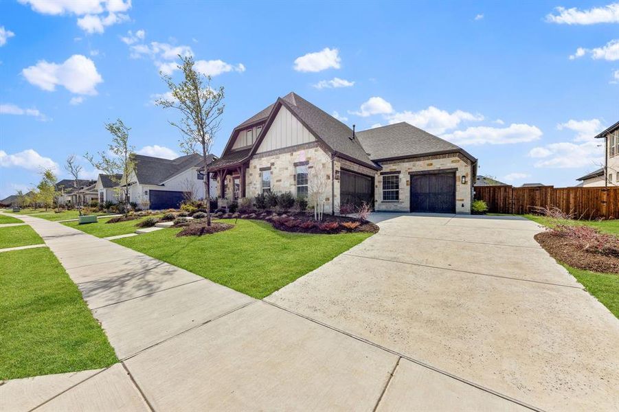 The long drive and spacious 3 car garage offer outstanding storage and plenty of space for family and friends to park.