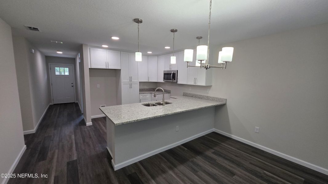 Furnished interior view inside a new home in , Jacksonville (Image 5). Furnished interior view inside a new home in , Jacksonville (Image 5).