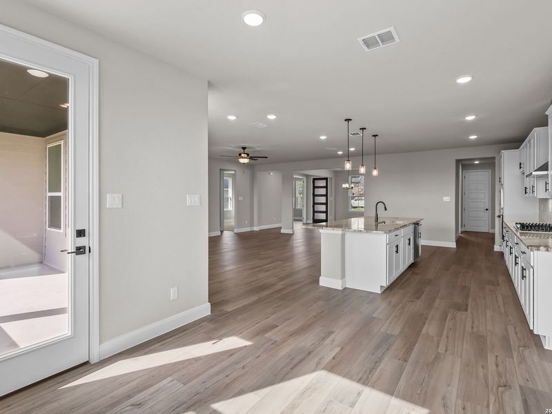 Furnished interior view inside a new home in Potranco Oaks, Castroville (Image 12).