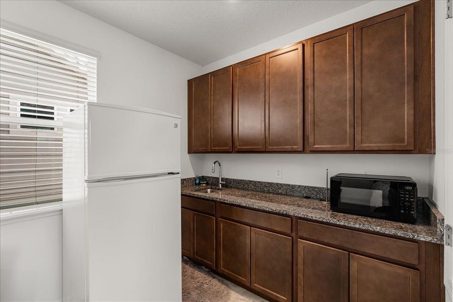 Furnished interior view inside a new home in , Winter Garden (Image 25).