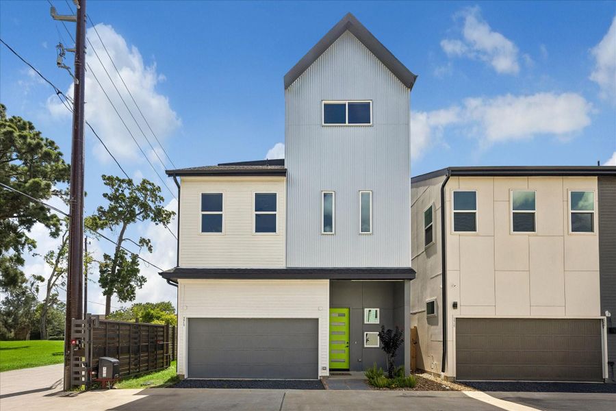 Front exterior showcasing contemporary architecture, clean geometric lines, and a distinctive vertical façade that defines the home's modern character. Front exterior showcasing contemporary architecture, clean geometric lines, and a distinctive vertical façade that defines the home's modern character.