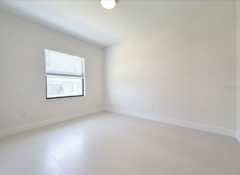 Spacious, unfurnished interior of a new home in , Port Charlotte (Image 39).