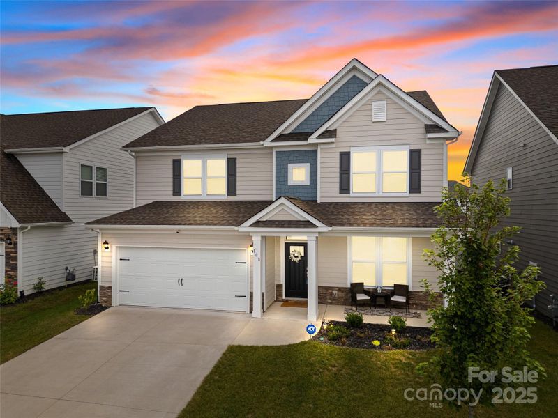 Front exterior of a new home in , Hendersonville, NC, highlighting curb appeal (Image 1).