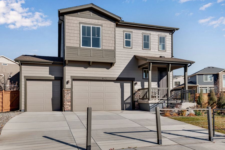 Representative exterior photo of a completed home built from the The Interlude by Tri Pointe Homes in Reunion, Commerce City, CO (Image 2). Representative exterior photo of a completed home built from the The Interlude by Tri Pointe Homes in Reunion, Commerce City, CO (Image 2).