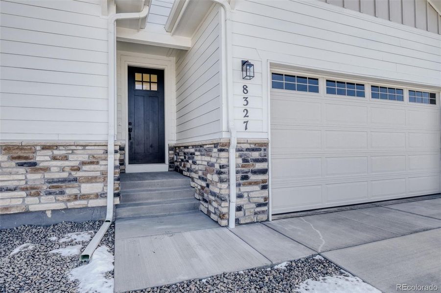 Exterior details and patio area of a home in Sterling Ranch Homestead, Colorado Springs (Image 16).