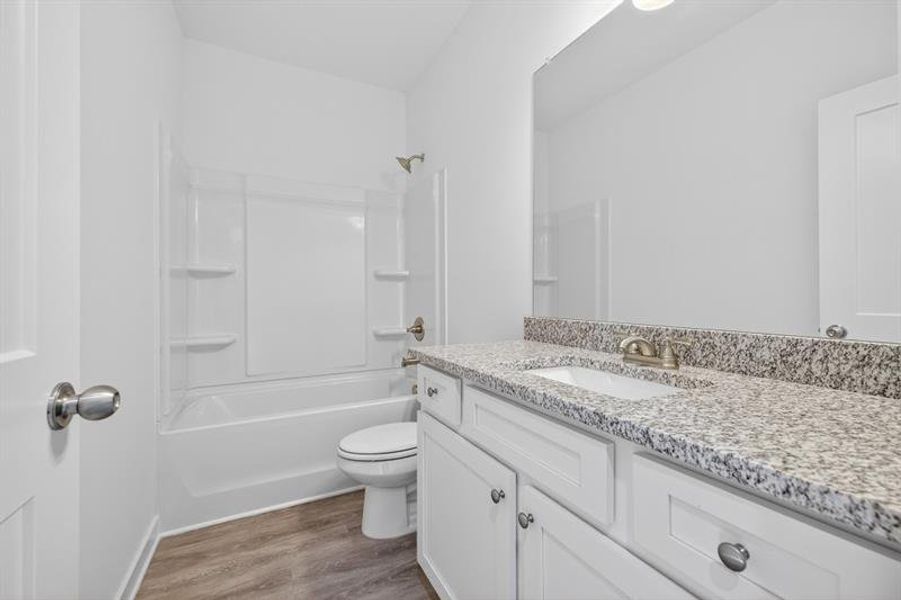 Furnished interior view inside a new home in Sutton's Landing, Statham (Image 10).