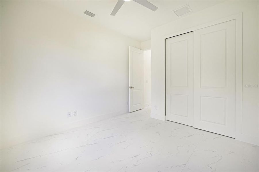 Spacious, unfurnished interior of a new home in , Port Charlotte (Image 27).