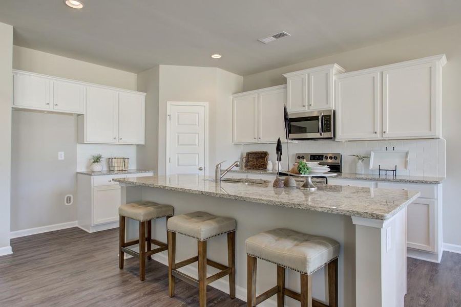 Furnished interior view inside a new home in Sutton's Landing, Statham (Image 21).