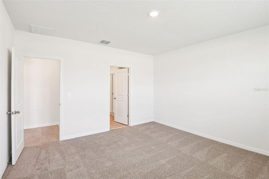 Spacious, unfurnished interior of a new home in Two Rivers - Classic Series, Zephyrhills (Image 9).