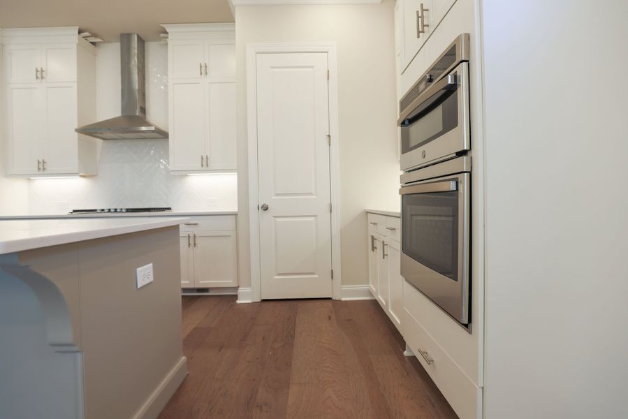 Representative furnished interior of a home built from the The Bennett by The Providence Group in Aberdeen, Hoschton (Image 9).