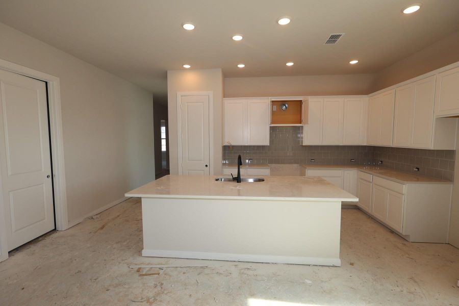 Furnished interior view inside a new home in Meridiana 45' Homesites, Manvel (Image 3).