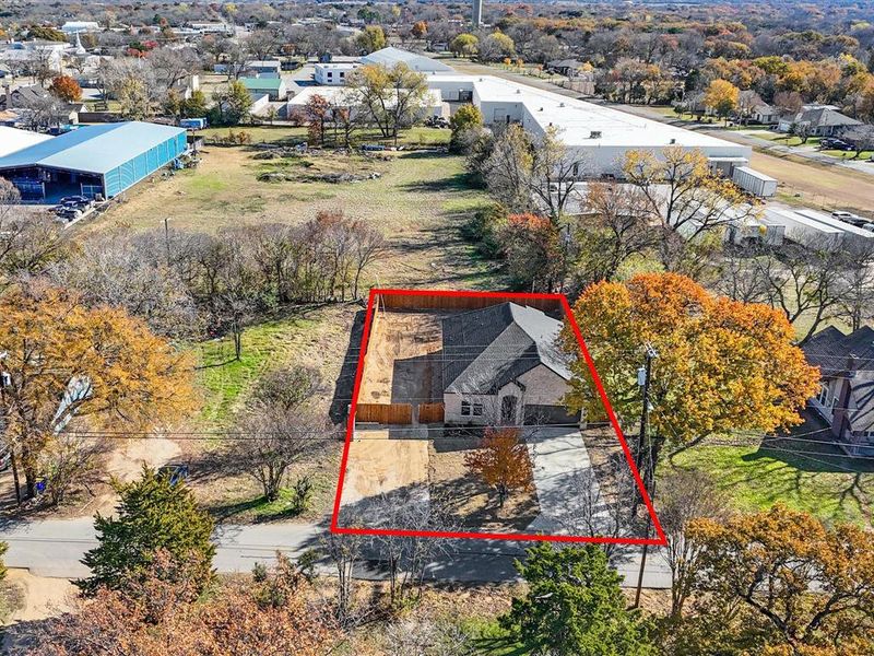 Aerial perspective of suburban area with property boundaries highlighted