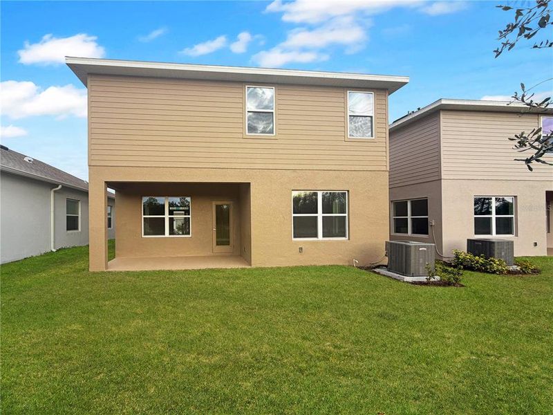 Exterior details and patio area of a home in Harmony Central, Harmony (Image 4).