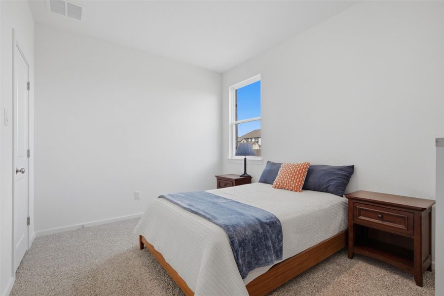 Furnished interior view inside a new home in , Manor (Image 14).