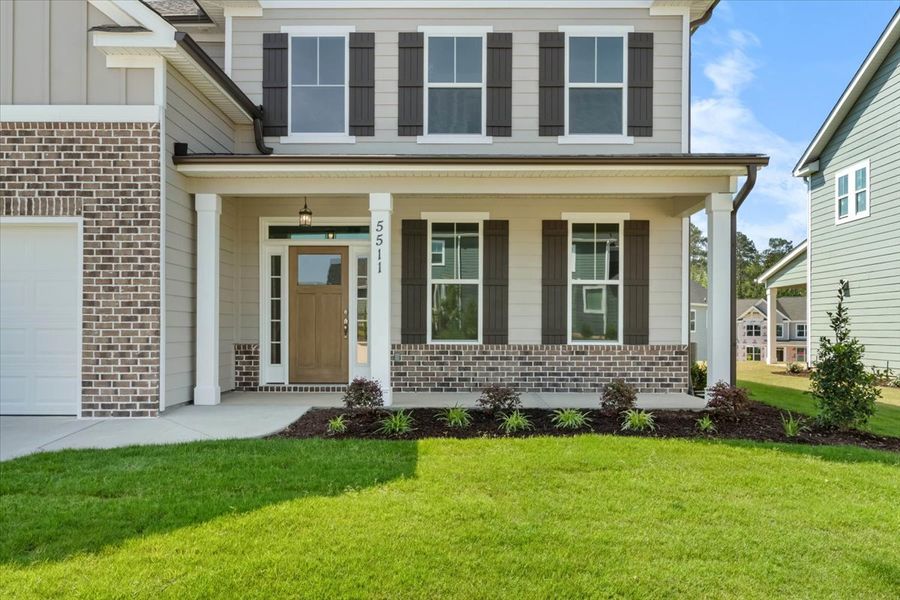 Front Exterior | 5511 Sweetwater Drive, Dublin II Plan by Ivey Homes Front Exterior | 5511 Sweetwater Drive, Dublin II Plan by Ivey Homes