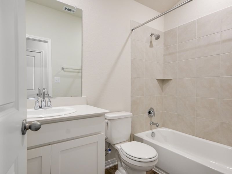 Furnished interior view inside a new home in Butler Farms - Reserve Collection, Liberty Hill (Image 5).