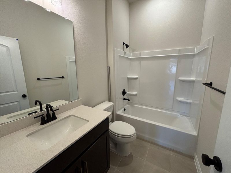 Furnished interior view inside a new home in Cannon Ranch 40s, Dripping Springs (Image 12).
