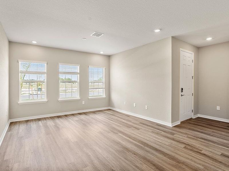 Inside, enjoy sunny, open-concept living space with LVP flooring.