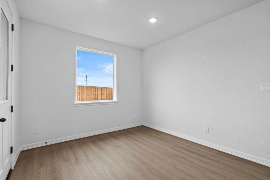 With an abundance of natural light streaming through the windows, the breakfast nook is bathed in a sunny glow, creating the perfect atmosphere to enjoy your morning coffee or a family breakfast.