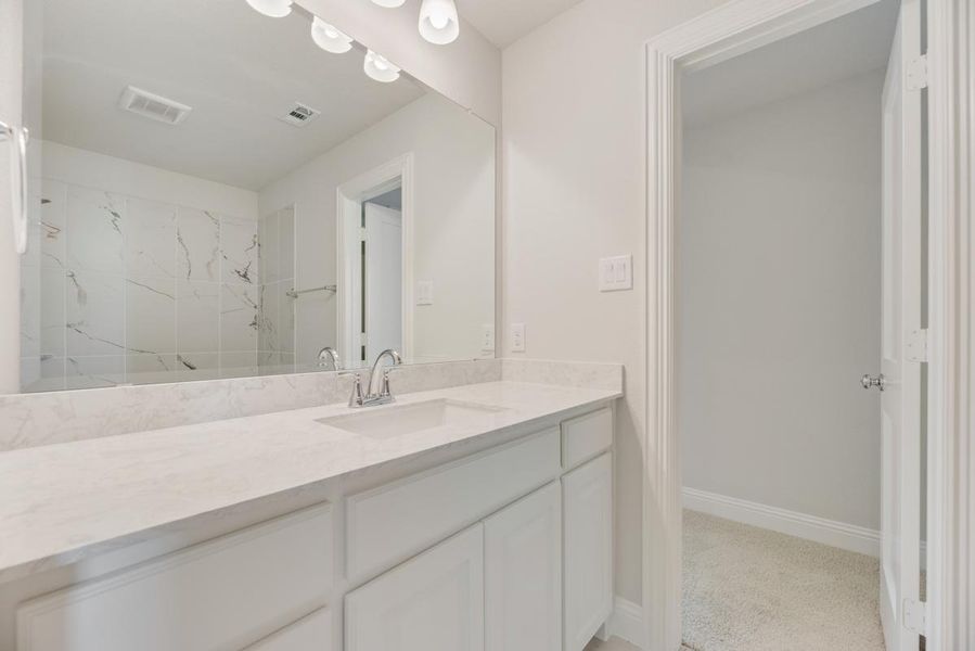 Representative furnished interior of a home built from the Royal Martinique by Grand Homes in Prairie Ridge, Venus (Image 8). Representative furnished interior of a home built from the Royal Martinique by Grand Homes in Prairie Ridge, Venus (Image 8).