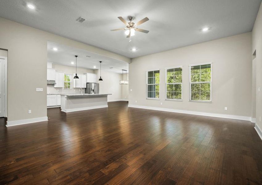 Open floor plan with wood flooring.