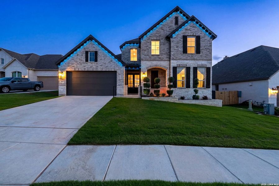 Front exterior of a new home in Ventana, Bulverde, TX, highlighting curb appeal (Image 27).