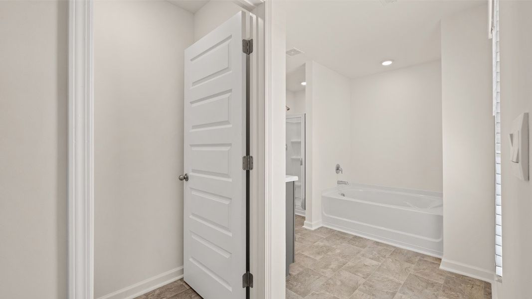 Representative unfurnished interior of a home built from the Flora by D.R. Horton in Fox Crossing, Griffin (Image 14).