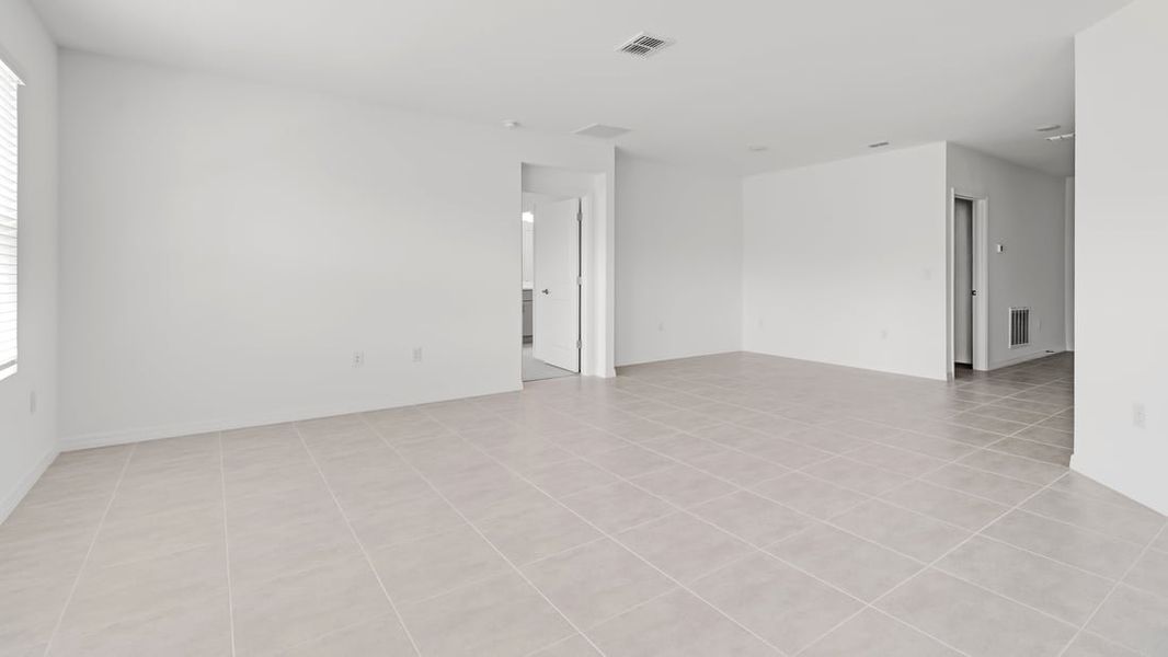 Representative unfurnished interior of a home built from the Ambrosia by Taylor Morrison in Aden South at Westview, Kissimmee (Image 16).