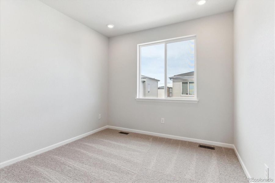 Spacious, unfurnished interior of a new home in Townhome Collection at Grand Vue at Interlocken, Broomfield (Image 13).