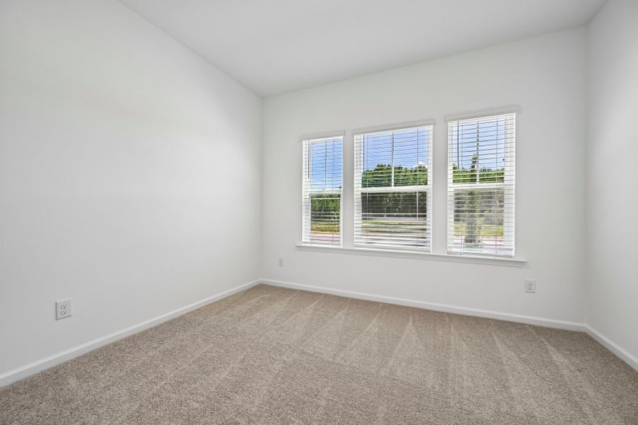 Representative unfurnished interior of a home built from the Emma II by Ashton Woods in The Point, Rolesville (Image 21).