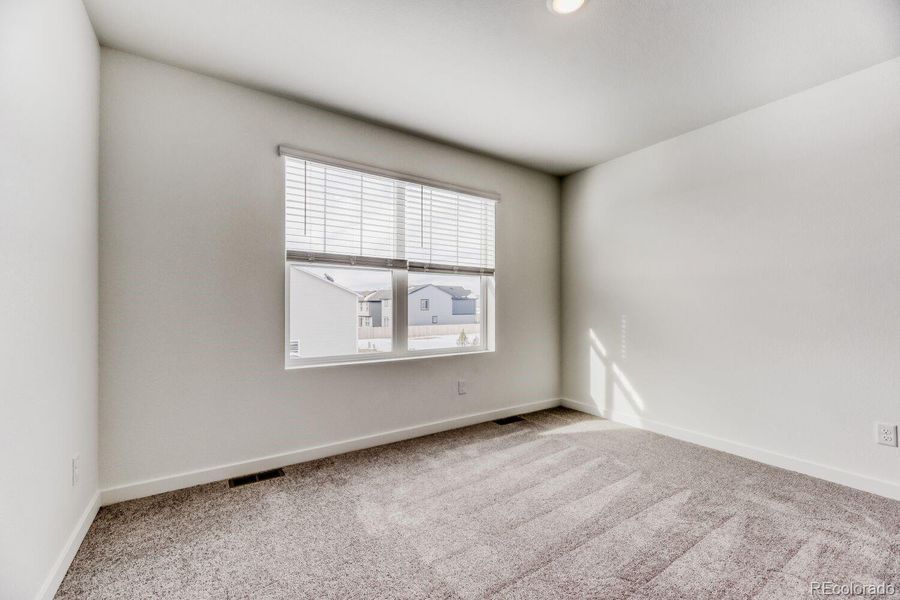 Spacious, unfurnished interior of a new home in Copper Chase, Colorado Springs (Image 7).